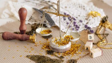 person sitting on chair in front of table with food